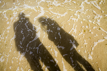 Image showing shadows of two people