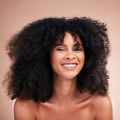 Image showing Black woman, afro hair or portrait smile on studio background in empowerment pride, curly texture or skincare glow. Beauty model face, happy or natural hairstyle and makeup aesthetic on isolated wall