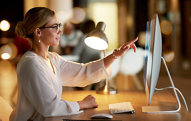 Image showing Business, computer or hologram screen touch in night office, finance planning or insurance management analytics. Happy smile, technology abstract or 3d futuristic interactive for working late woman