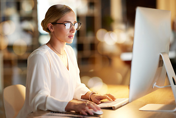 Image showing Business, night and woman with computer, typing and data analysis for project, profit growth and focus. Female employee, leader and manager with pc, overtime and online reading for search website