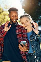 Image showing Video call, hello and couple of friends at park for social media update, live streaming date and influencer talking. Interracial people, online 5g communication and international holiday or vacation