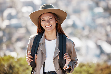 Image showing Woman, tourist and portrait smile for travel, hiking adventure or backpacking journey on mountain in nature. Happy female hiker smiling and enjoying trekking, trip or scenery on blurred background