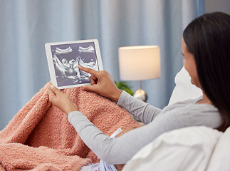 Image showing Pregnant, ultrasound scan and mother with tablet in bed with digital x ray of baby, infant and child. Pregnancy love, family home and happy woman excited with prenatal picture on screen in bedroom