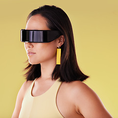 Image showing Vr, 3d metaverse and woman in virtual reality, exploring cyber world or futuristic tech. Future fantasy, gamer and female with digital ai glasses for gaming in studio isolated on a yellow background.