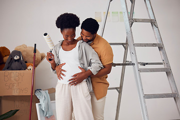 Image showing Love, pregnancy or happy couple hugging in home renovation, diy or house remodel together by apartment ladder. African people, painting or black man with pregnant woman excited about baby or family