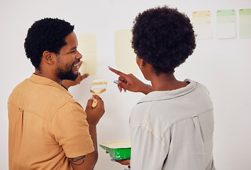 Image showing Painting, wall or happy black couple in DIY, home renovation or house remodel together with a paintbrush. Back view, smile or African man speaking to a woman working with team work in partnership