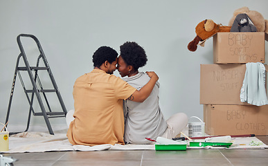 Image showing Forehead, floor or black couple love home renovation, diy or house remodel a wall together. Back view, painting or African man with a happy woman planning or hugging with teamwork in partnership