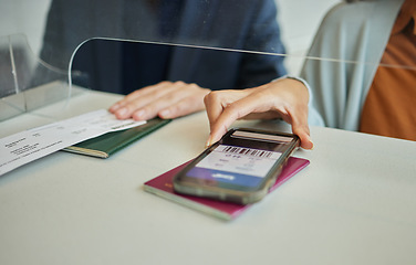 Image showing Smartphone, digital plane ticket and woman, barcode and passport, booking at airport for travel. Technology, female hand with airline boarding pass, person check in for vacation with mobile app