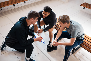 Image showing Sports, team coach and men for strategy in gym locker room for game practice, exercise and training. Personal trainer, fitness club and male athletes planning, prepare and talking for workout routine