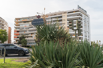 Image showing Spanish flags are hung from the balconies