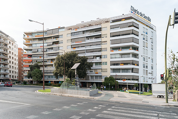 Image showing Spanish flags are hung from the balconies