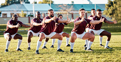 Image showing Rugby, warm up or team stretching in training, exercise or practice with solidarity or unity together. Collaboration, fitness group or athletes exercising to start a game or match in sports stadium
