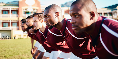 Image showing Man, huddle and team on grass field for sports coordination or collaboration outdoors. Group of sport men in fitness training, teamwork or strategy scrum getting ready to play game or match