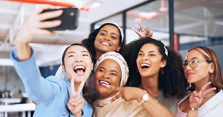 Image showing Business people, peace sign and phone selfie in office for happy memory, profile picture or social media. Tech, cellphone and group of women, friends or coworkers taking pictures on mobile smartphone