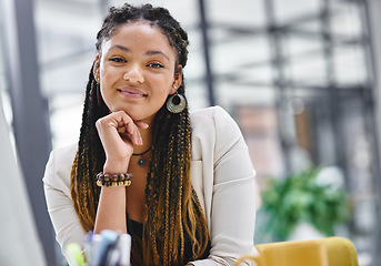 Image showing Im confident in my business abilities. Cropped portrait of an attractive young businesswoman sitting at her desk in the office.