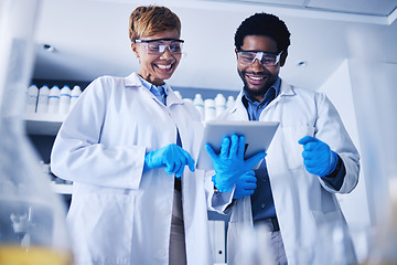 Image showing Tablet, science and collaboration with a team working on research in a lab together for innovation or growth. Doctor, teamwork or medical with a black man and woman scientist at work in a laboratory