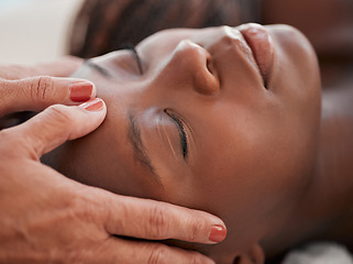 Image showing Skincare, beauty and black woman getting a facial massage for health, wellness and self care. Cosmetic, spa and calm African female sleeping while doing a luxury natural face treatment at a salon.