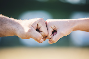 Image showing Fist bump, hands and outdoor with touch, teamwork and greeting for respect, support and motivation. Man, woman and hand together for connection, partnership and team building for sport, deal or goal