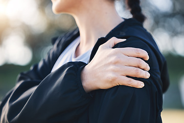 Image showing Closeup, shoulder pain and woman with stress, burnout and muscle tension with girl outdoor. Fitness, female athlete and lady with ache, inflammation and injury with emergency, accident and outside