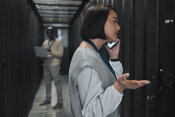 Image showing Phone call, technician and woman in a server room for maintenance, repairs or data analysis. Systems, technology and Asian female engineer on mobile conversation while checking power of cable service