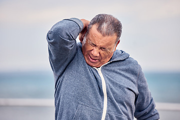 Image showing Fitness, outdoor and man with back pain, injury or accident while training for marathon or race. Sports, workout and senior male athlete with medical emergency or sprain muscle after cardio exercise.