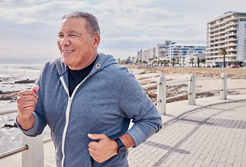 Image showing Senior man, fitness and running at ocean sidewalk for energy, wellness or workout in Miami. Elderly male, cardio exercise and happy runner at seaside promenade of training, sports and smile of action