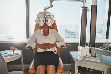 Image showing Vision test, eye exam and woman in optometry clinic for testing, eyesight and optical assessment. Healthcare, optometrist consultation and patient with medical equipment, phoropter and lens for eyes