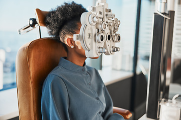 Image showing Healthcare test, eye exam and black woman in optometry clinic for testing, eyesight and optical assessment. Vision, optometrist consultation and patient with medical tool, phoropter and lens for eyes