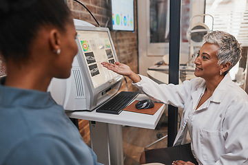 Image showing Elderly ophthalmologist woman, computer and eye exam results with consultation, advice and smile. Optometrist, doctor and happy with African patient for analysis, consulting or medical help in office