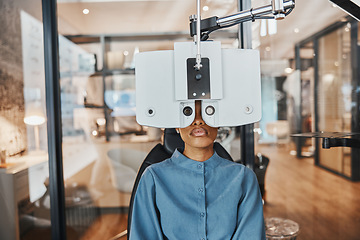 Image showing Optometry, eye exam and black woman for vision, healthcare test and optical assessment for glasses. Ophthalmology, optometrist clinic and patient with medical equipment, phoropter and lens for eyes