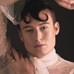 Image showing Portrait, non binary fashion and vintage aesthetic with designer clothing and beauty in studio. Isolated, black background and lgbtq or gay model with contemporary creativity and gender neutral art