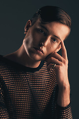 Image showing Gender neutral person, fashion and portrait on dark background, trendy and edgy. Creative, gen z and thinking with beauty, sexy with cosmetics and serious, non binary and designer clothes in studio