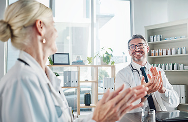 Image showing Doctors, applause and support with medical success for team building or collaboration in healthcare at hospital. Happy, celebrate or winner for health achievement, medicine research or promotion