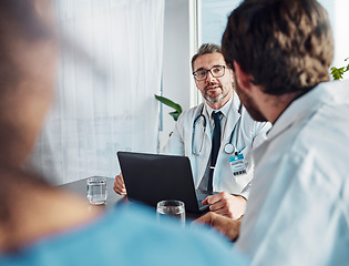 Image showing Doctors, teamwork or research on laptop for health, medicine or healthcare innovation planning, collaboration or consulting in hospital. Computer, nurses or meeting for medical surgery strategy