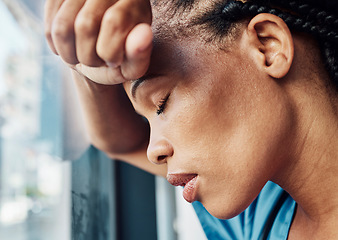 Image showing Doctor, black woman stress or anxiety by window in hospital, workplace and tired in healthcare job, pain or headache. Burnout nurse, sad or exhausted in medical clinic or depression in health clinic