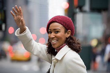 Image showing Woman Hailing a Cab