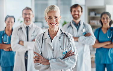 Image showing Healthcare, leadership and team portrait of woman doctor and nurses in hospital with support and success in teamwork. Health, help and medicine, confident doctors and medical employees smile together