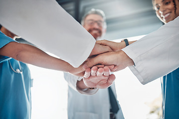 Image showing Doctor, team and hands together in healthcare agreement, trust or partnership for success or unity at clinic. Group of medical experts piling hand in teamwork collaboration, achievement or goals