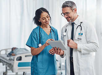 Image showing Digital tablet, collaboration and team of doctors analyzing results or diagnosis of patient in clinic. Teamwork, medical and healthcare workers in discussion and research on mobile device in hospital