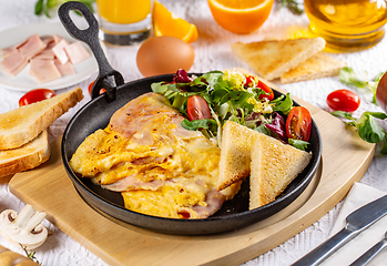 Image showing Omelette with ham and cheese