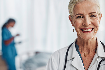 Image showing Healthcare, smile and portrait of senior woman doctor in hospital with confidence and success in medical work. Health, medicine and face of confident mature professional with stethoscope and mockup.