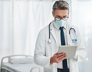 Image showing Healthcare mask, research and doctor with tablet for wellness, medical care and report. Hospital, life insurance and senior health worker on digital tech for internet, patient data and telehealth app