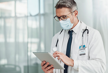 Image showing Hospital, research and doctor with tablet and mask for wellness, medical care and patient data. Healthcare, insurance and senior man on digital tech for online consulting, report and telehealth app