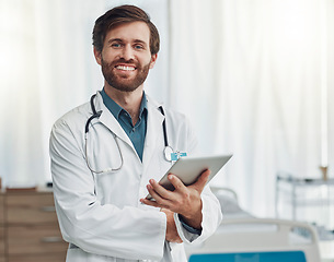 Image showing Healthcare, research and portrait of doctor on tablet for wellness, medical care and analysis. Hospital mockup, insurance and happy man on digital tech for internet, patient data and telehealth app