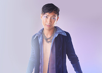 Image showing Art, makeup and lgbt portrait of man in Indonesia, gen z person isolated on purple background. Style, aesthetic and fashion model with beauty in studio, creative non binary and gender neutral design.