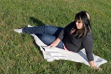 Image showing Young Woman Reading