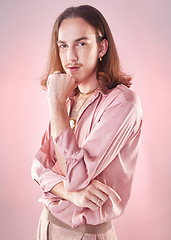 Image showing Portrait, retro fashion and lgbt man, pride and confidence isolated on pink background. Style, aesthetic and art, gay male model in beauty and creative non binary and gender neutral design in studio.
