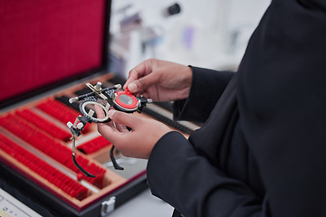 Image showing Glasses, lens and hands with ophthalmology tools, trial frame with woman, healthcare for eyes and prescription test. Optometry, eye care and female optometrist, medicine and chart with measurement