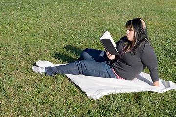 Image showing Young Woman Reading