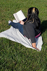 Image showing Young Woman Reading